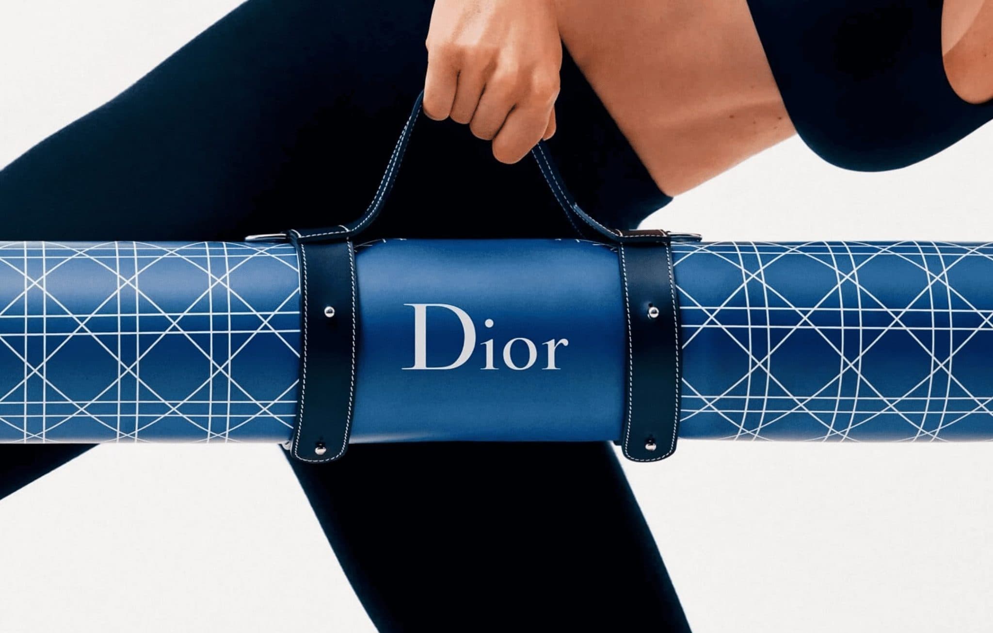 Dior Haute Wellness collection — yoga mat, resistance bands, and wellness accessories in blue and ivory cannage motif